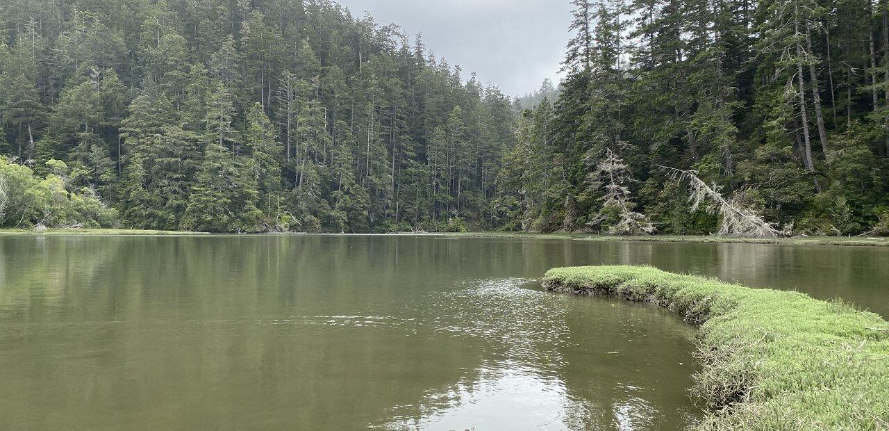An image of a lake with mountains around