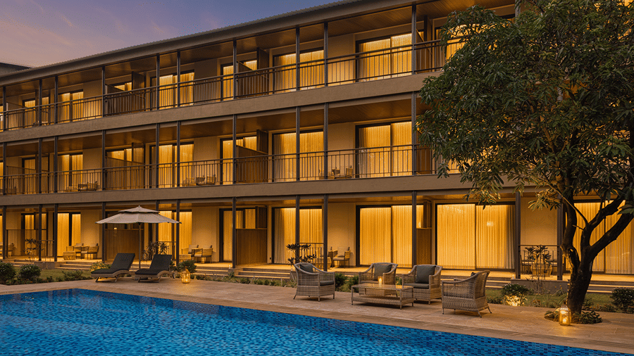 Exterior view of The Riverview Retreat, Corbett, with a swimming pool and guest rooms overlooking the pool.