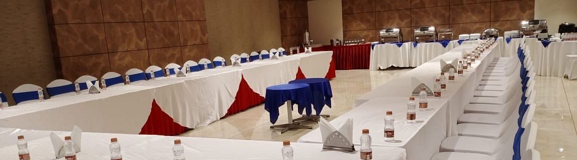 Terminal 01 Hall at Wonder Country Club and Resort, Kharagpur featuring U-shaped table and chair arrangement with elegant, stylish lighting