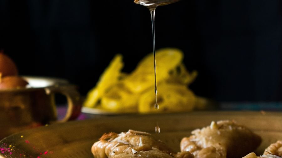 Atmospheric nighttime dining experience with warm golden accents and premium table setting