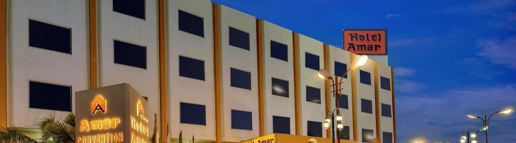 Overview image of the facade of Hotel Amar with the name written on the board