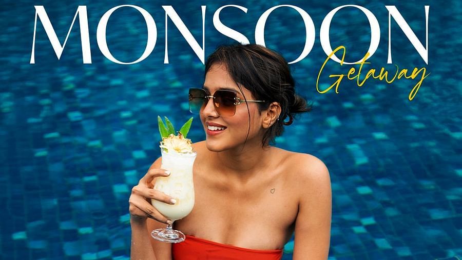 A poster for Monsoon Getaway at The Dukes Retreat featuring a woman in a red swimsuit holding a drink in a pool