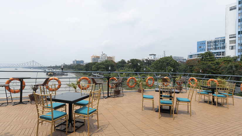 the seating area at the deck outside - Polo Floatel Kolkata