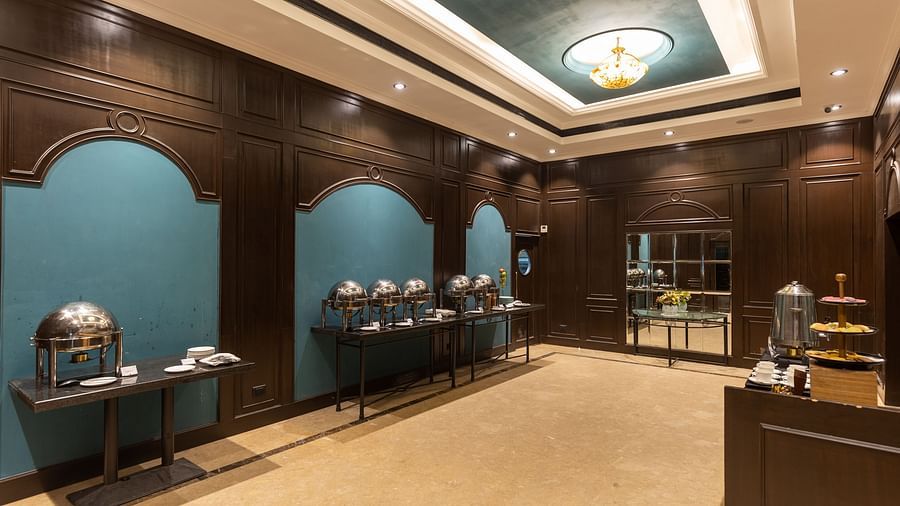 Elegant dining area with arched alcoves and buffet