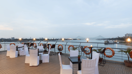 seating arrangements on the the open air deck at Polo Floatel Kolkata