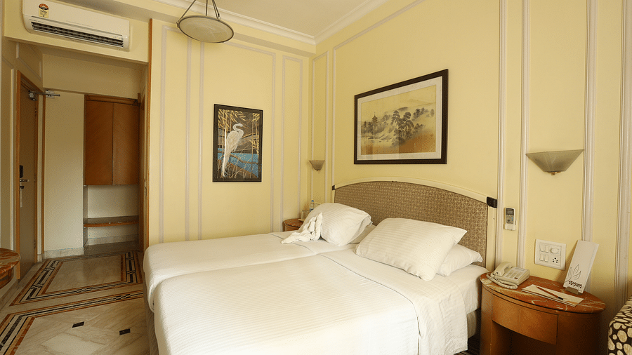 Twin beds in the Standard Room at Regency Hotel, Mumbai.