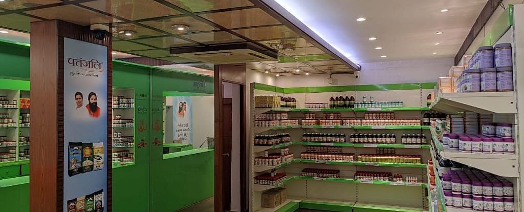 A brightly lit interior space, perhaps a shop or display area at Vedikant Resorts The Mallard Corbett, shows various items.