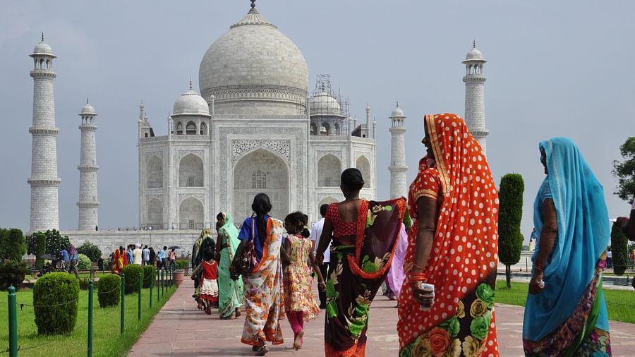 Tourists visiting the Taj Mahal, a must visit place in Agra