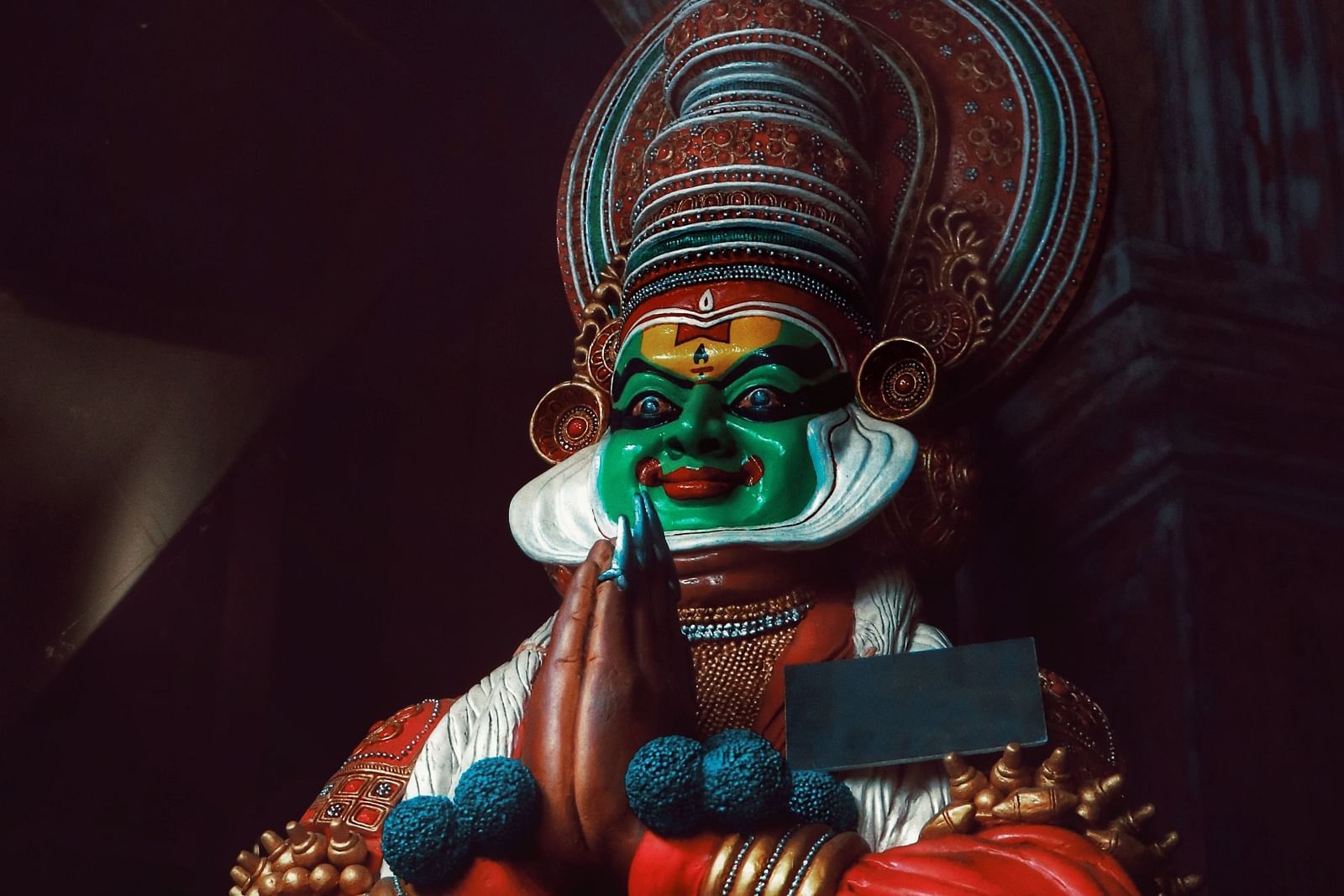 an image of a person dressed to perform Kathakali - Kumarakom Tourism