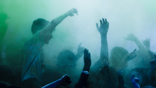 a group of people enjoying in a concert