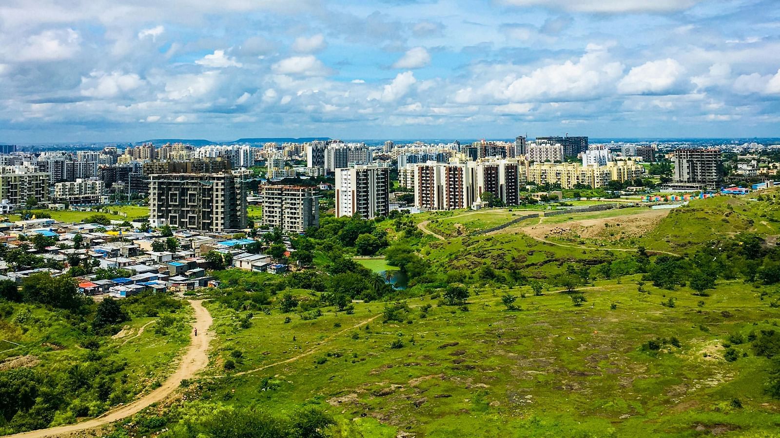Aerial view of an industrial area on a sunny day.