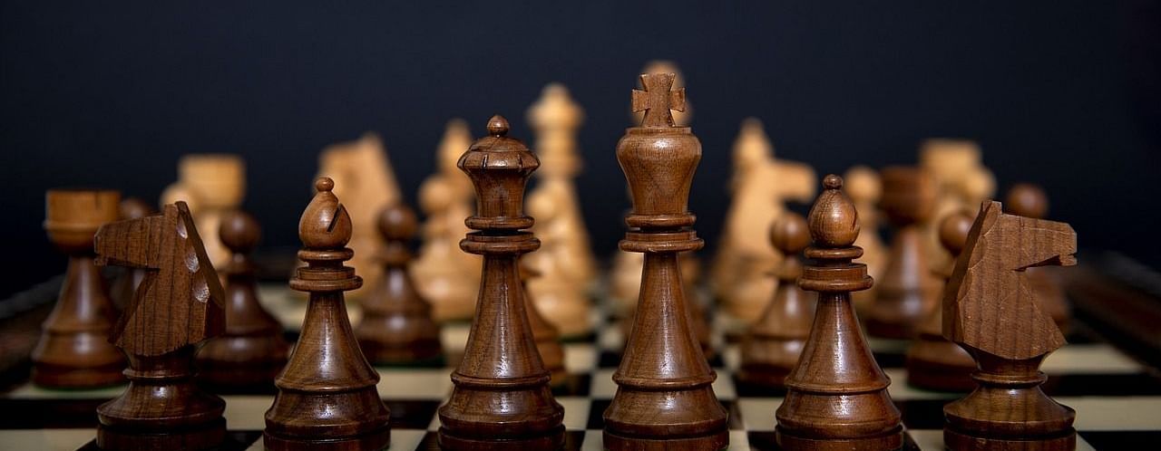 An image of a chess pieces placed on a chess board