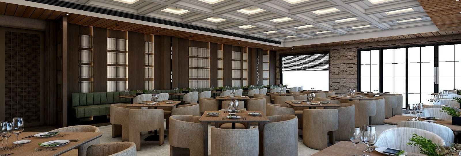 Corner view image of the restaurant with well arranged seating area and a false ceiling above it - Namaste Corbett