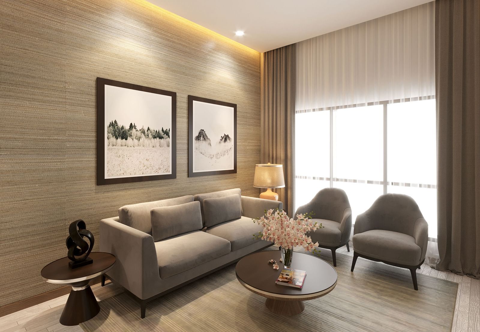 One Bedroom Suite in Kinshasa at Kertel Suites with a grey sofa set with two paintings hung over it