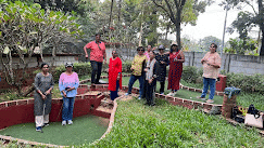 Group activity at Fantasy Golf Resort, Bangalore with guests enjoying outdoor games together.