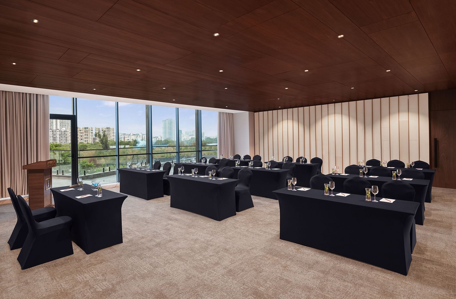 Carnival 1 with comfortable seating facing the stage at Essentia Premiere, Pune.