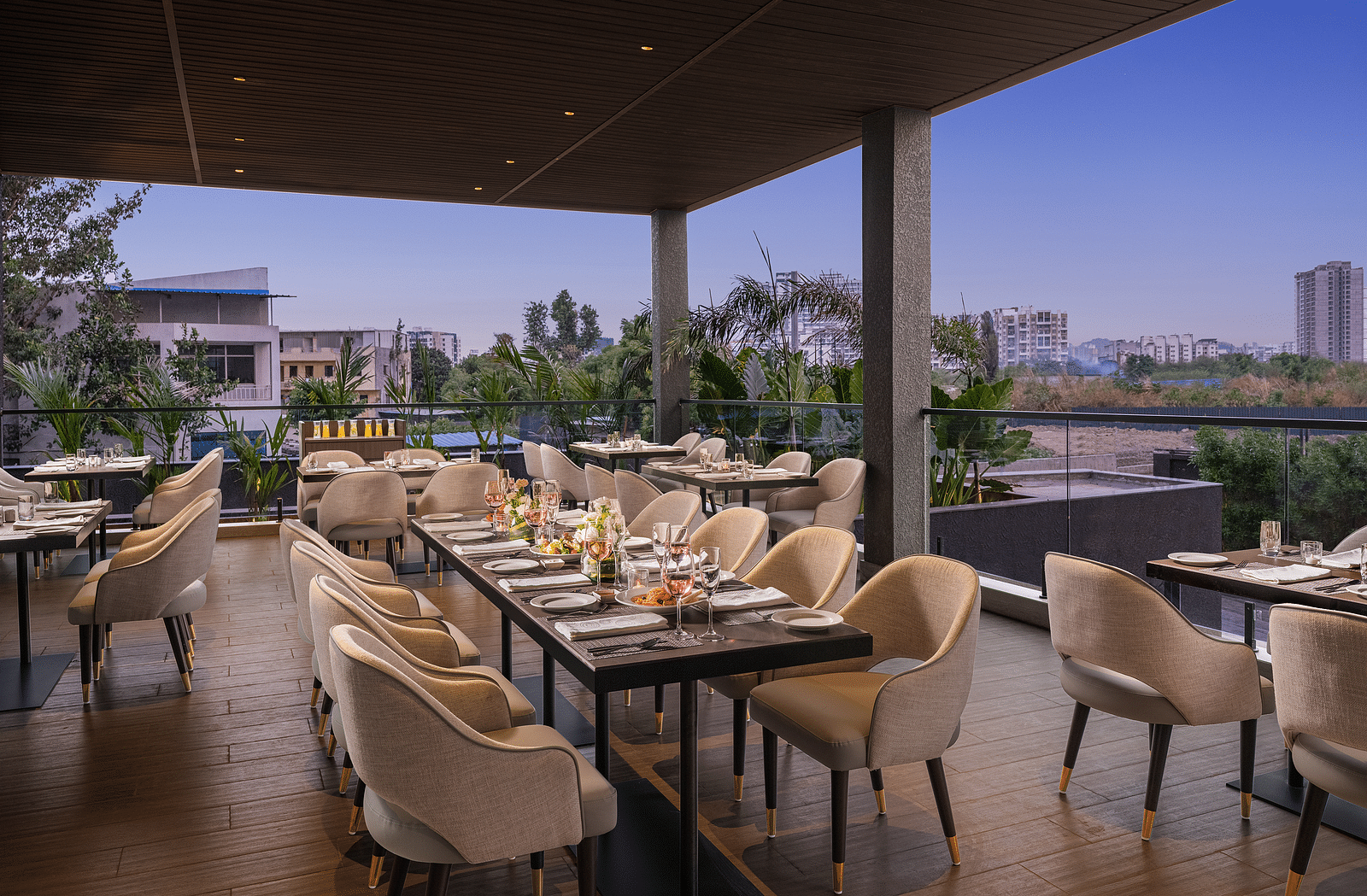 A view of dining area at Citron Bar with comfortable seating at Essentia Premiere, Pune.