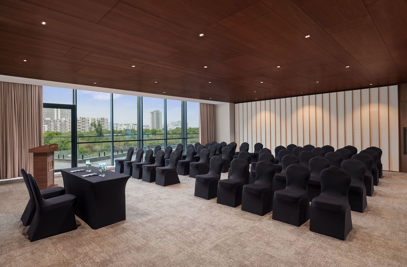 Carnival 1 with comfortable seating facing the stage at Essentia Premiere, Pune.