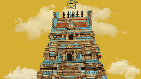 A multi-coloured temple gopuram with intricate details and sculptures under a bright yellow sky.