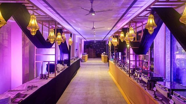 alt-text Banquet hall with tables set for a formal event.