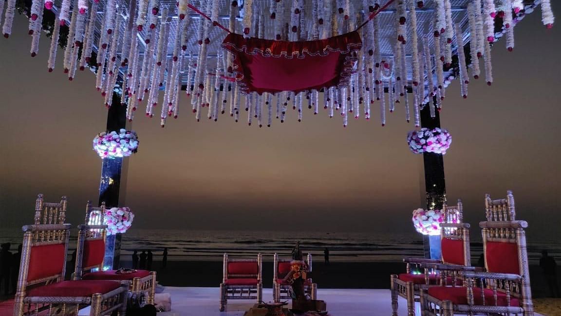 The decorated roof of an outdoor wedding podium near the beach - destination wedding in Goa - Caravela Beach Resort, Goa
