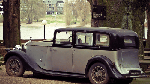 A rolls royce phantom car parked