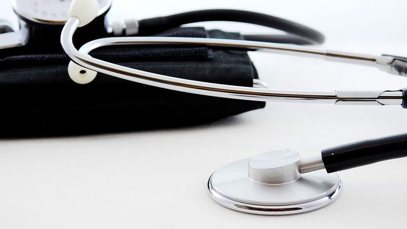 A stethoscope placed over a black pouch.