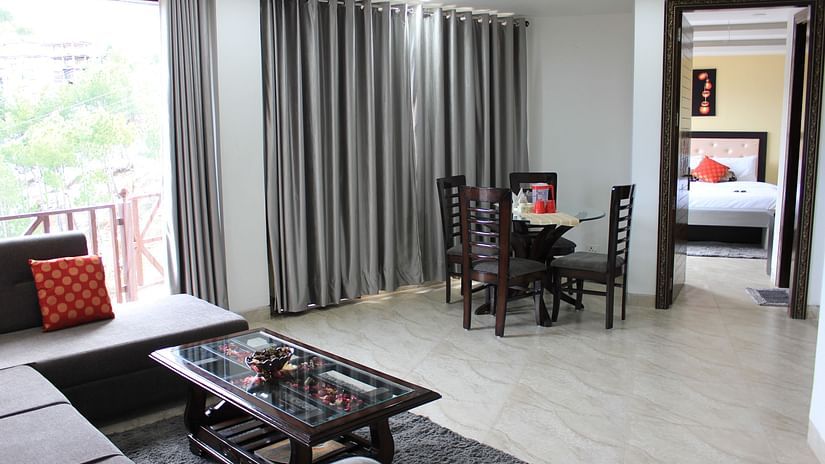 the living room attached to the bedroom - Silverpine Apartments & Homestay, Mehli