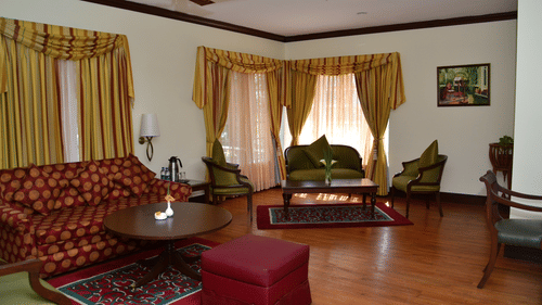 living room of one of the Cottagesat The Carlton Kodaikanal 42695
