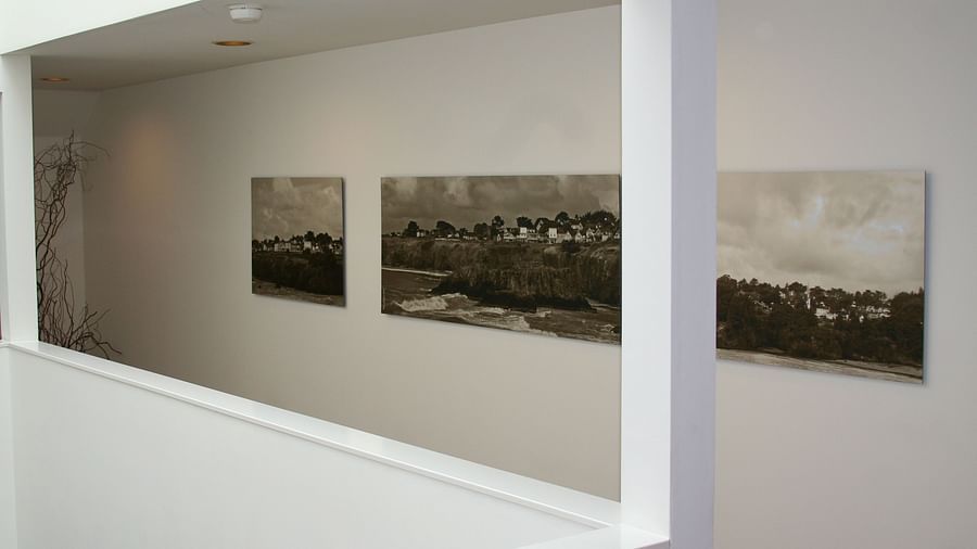The public area with paintings of landscapes hanged for display - Brewery Gulch Inn & Spa