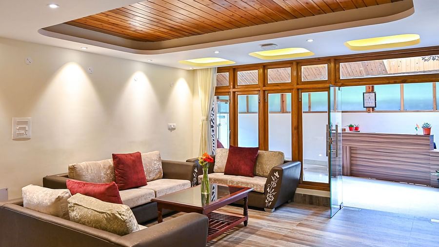 a expansive lobby with plush couch at Yashshree Karbari Resort & Spa, Yangang