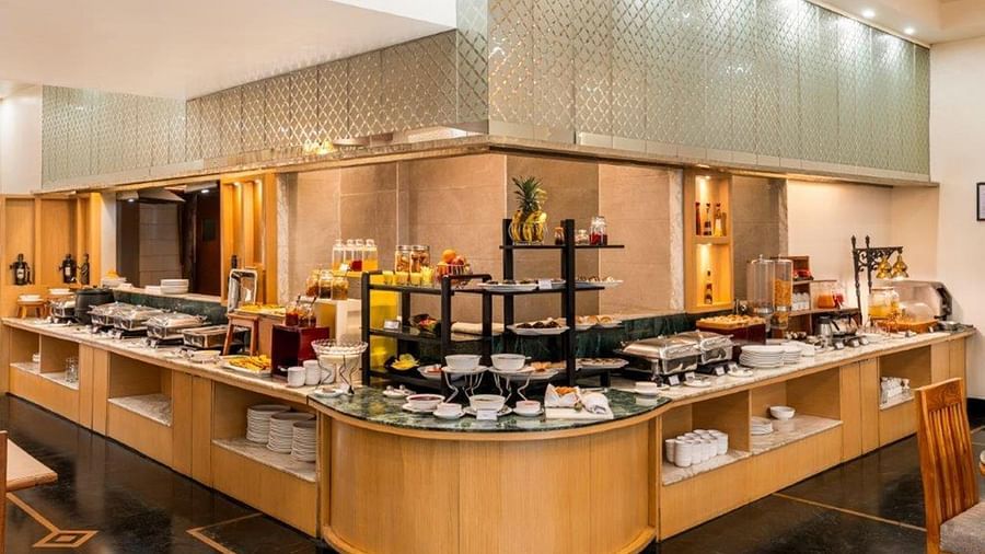 The buffet counter with food items at Golden Tulip, Udaipur.