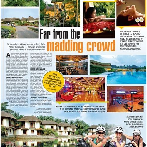A newspaper page titled Far from the Madding Crowd featuring images of a resort, food, and people enjoying leisure activities at Vedic Village Spa Resort.