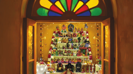 Brightly lit temple interior framed through an ornate  window
