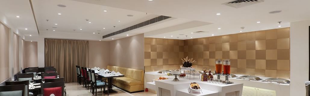lavish seating at Cafe Inde at Inde Hotels Vista Woods, Guragon 