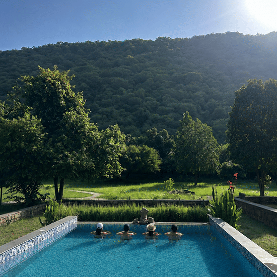 Pool View wtih Aravali Range-Surya bagh