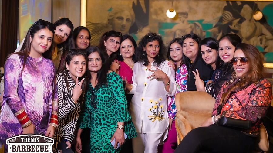 An image of a group of people posing at Themis Barbecue House, Panipat