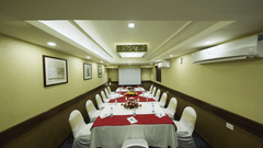 the seating area at one of the meeting rooms at MGM Beach Resorts in Muttukadu