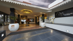 The facade and the entrance of MGM Beach Resorts - MGM Hotels and Resorts