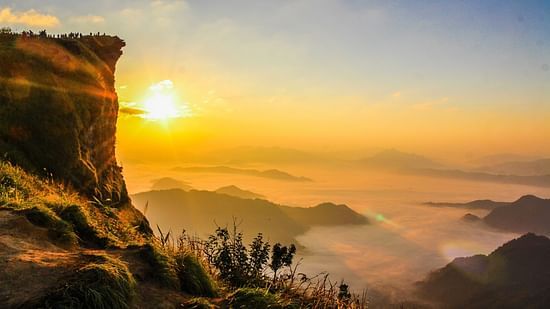 aerial-photo-of-mountain-surrounded-by-fog-733174