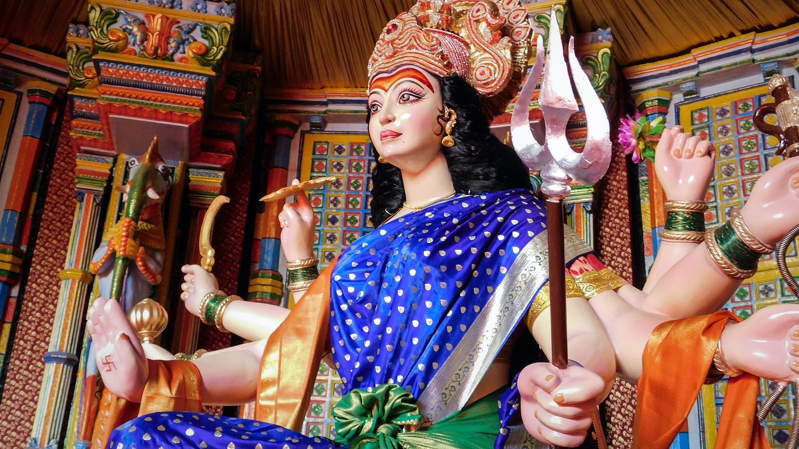 Maa Durga statue where the Goddess is draped in a blue saree