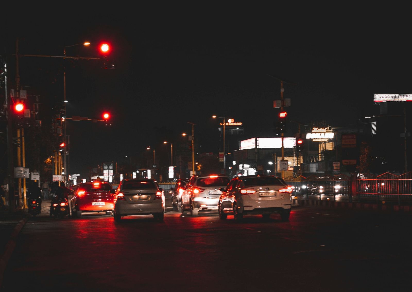 An overview of the traffic in Indore during the night with many vehicles in view.