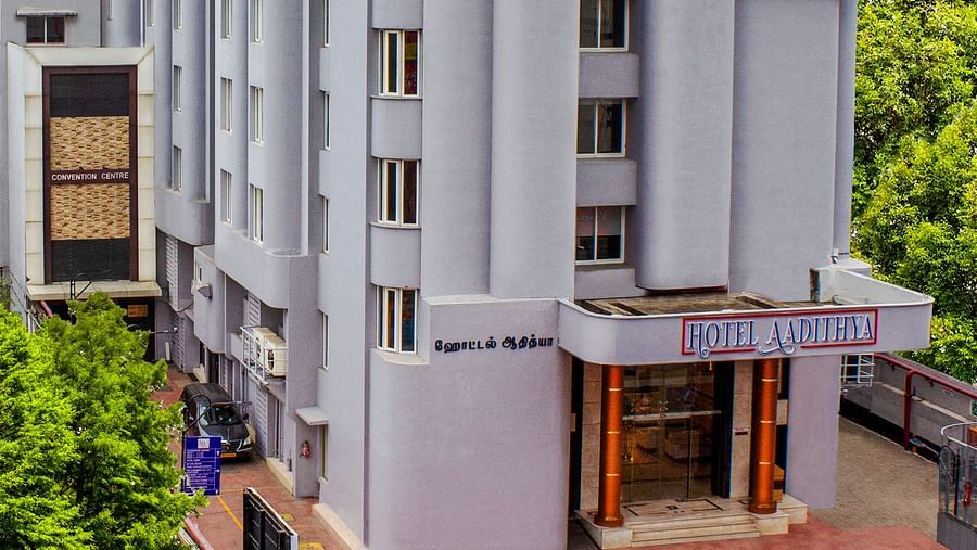 A bright morning view of the facade of Hotel Aadithya, Chennai
