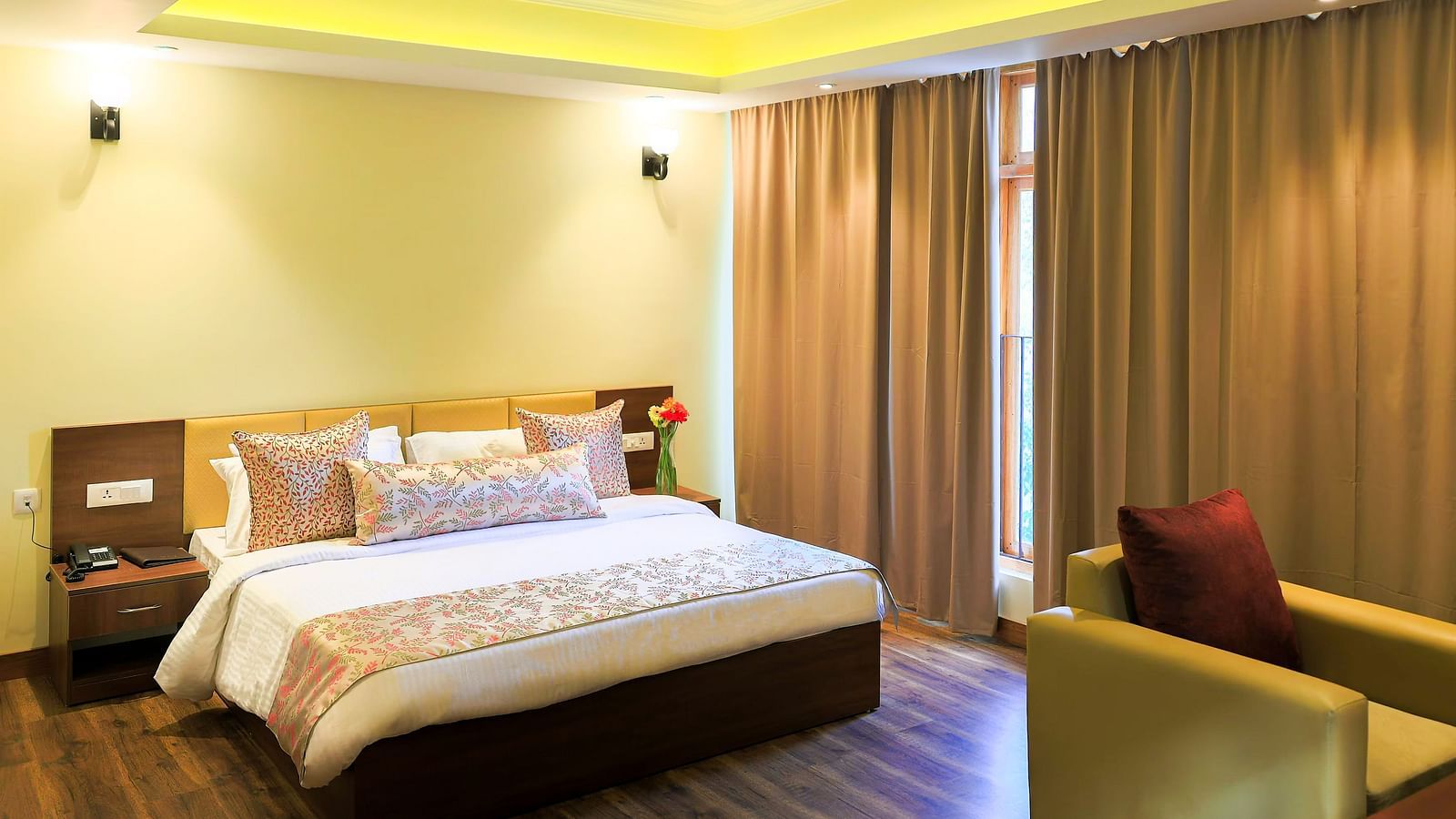 the senior suite at Yashshree Karbari Resort & Spa, Yangang featuring a double bed in the middle of the room