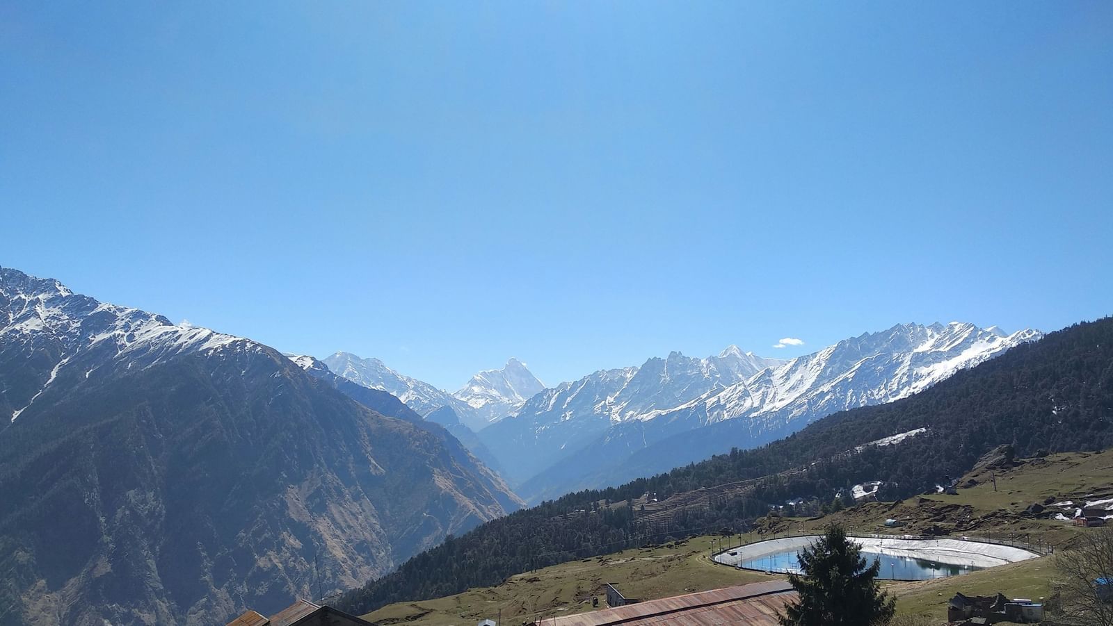 image showcasing splendid views of the himalayas with a clear blue sky in the background