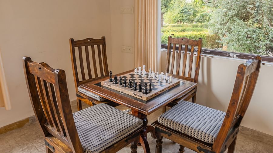 A chessboard set up on a table in a guest room at Clarks Inn Suites, Ranthambore.