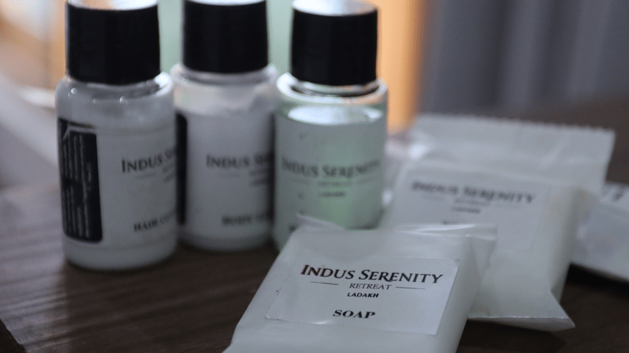 Toileteries placed in different bottles includig hair, body washes, and soaps | Indus Serinity, Leh Ladakh