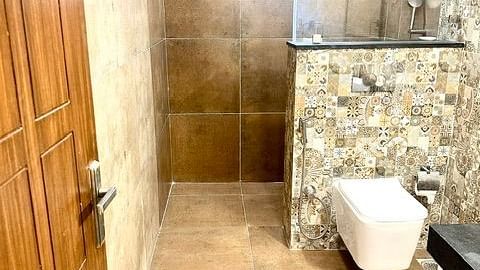 view of a Heritage Suite Bathroom at Summer House, Nandi Hills