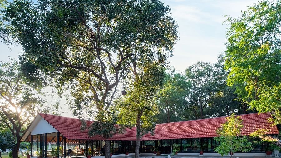 facade image of aranya vilas on a bright morning with clear blue sky in the background