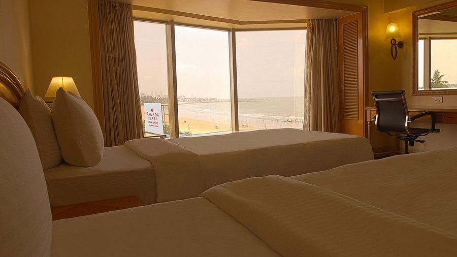 twin beds in a Premium Partial Sea View Room at ramada plaza 3